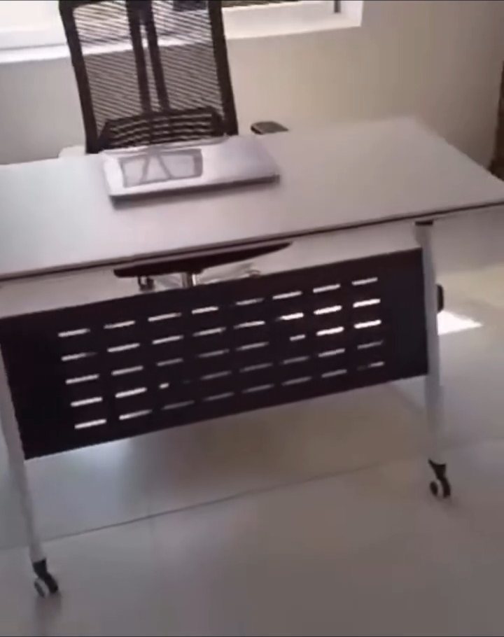 Executive office desk with mesh chair